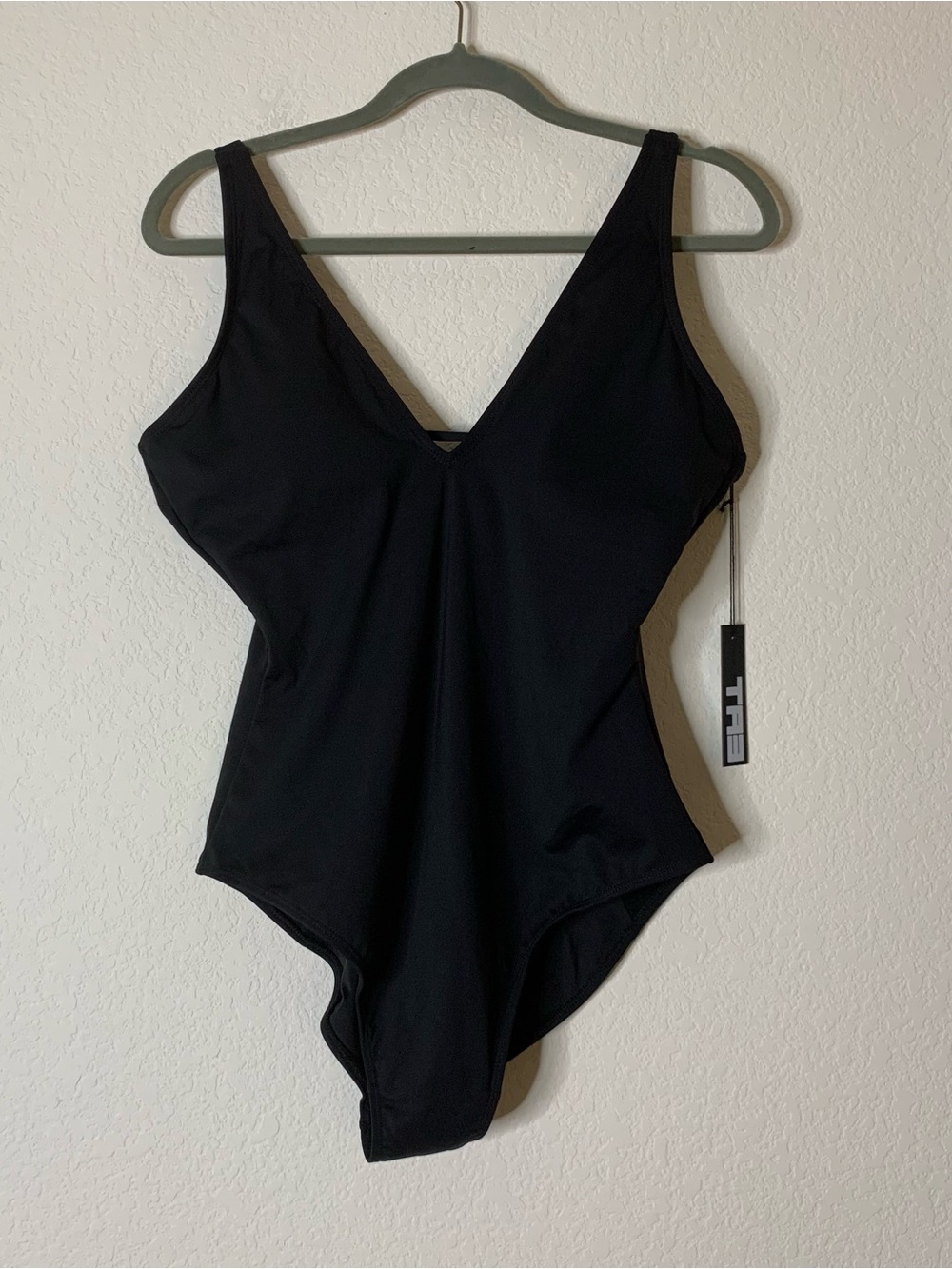 TA3 womens black plungey lace up back one piece swimsuit L/ Long NWT
